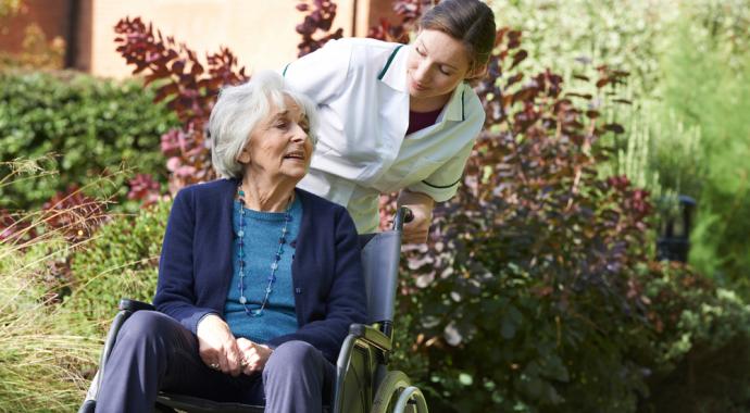 old lady in wheel chair with nurse problem of aging for budgeting Your Budget Plan